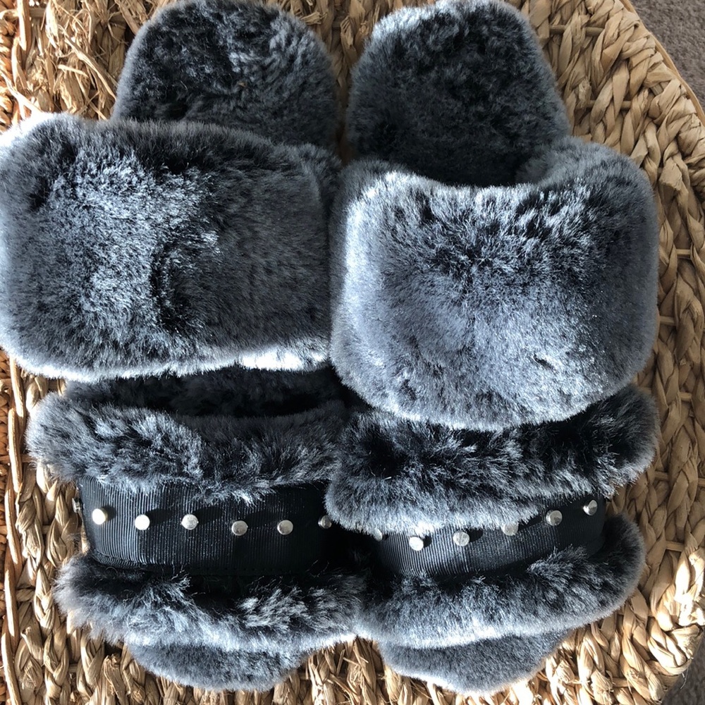 EMU rhinestone slippers.